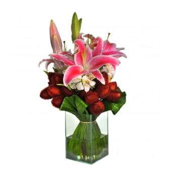 Arranjo de Lirios Rosa no Vidro Médio