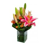 Lírios Rosa No Vidro Médio